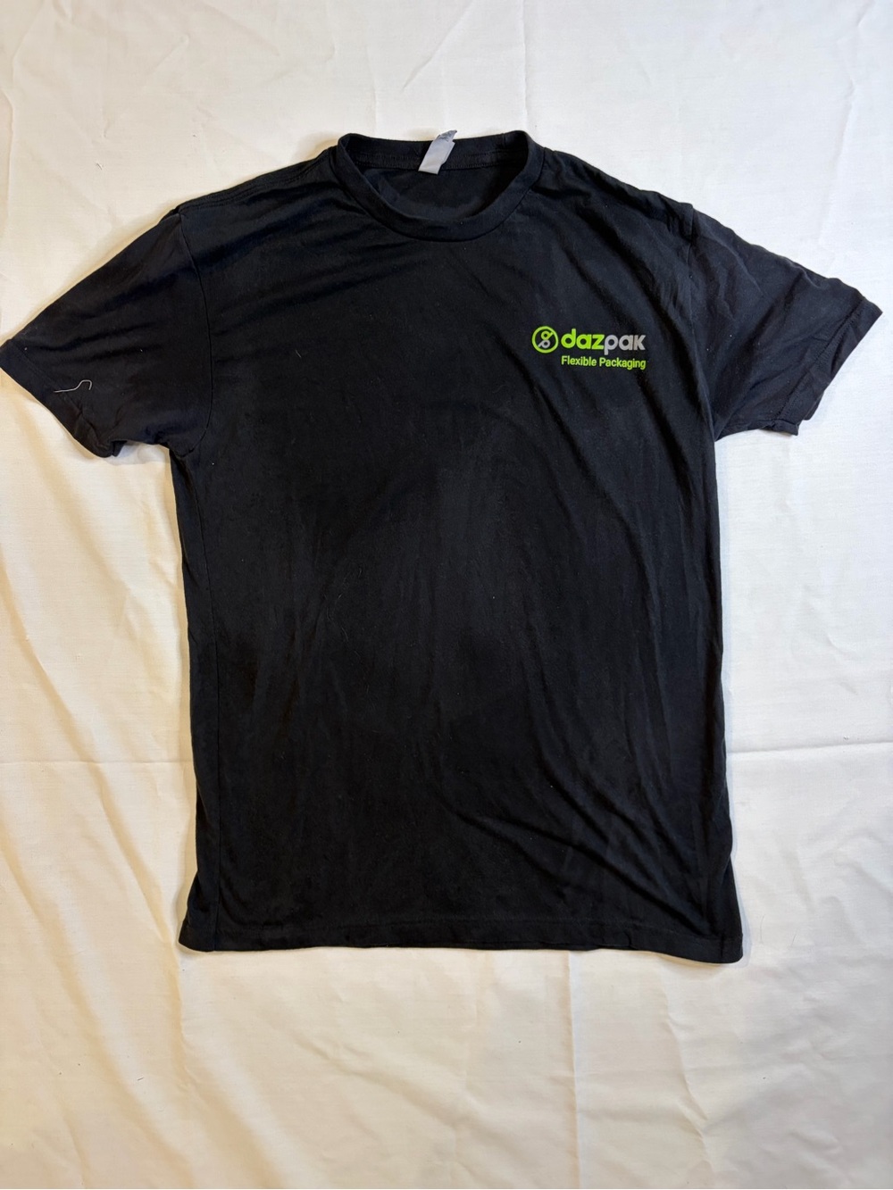 Next Level Apparel Black T-Shirt with Green Dazpak Logo